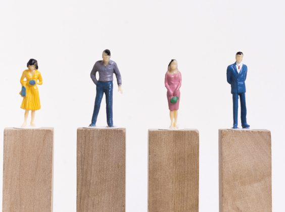 business-man-woman-sitting-equal-pieces-wooden